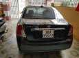Cần bán Daewoo Lacetti Ex đời 2005, màu đen, xe gia đình sử dụng nên rất giữ xe