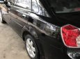 Cần bán Daewoo Lacetti 1.8MT đời 2004, màu đen, xe nhập xe gia đình