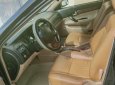Cần bán gấp Daewoo Magnus AT năm 2005, màu đen, nhập khẩu nguyên chiếc, điều hoà lạnh