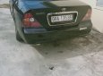 Cần bán gấp Daewoo Magnus AT năm 2005, màu đen, nhập khẩu nguyên chiếc, điều hoà lạnh