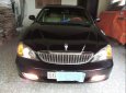 Gia đình bán xe Daewoo Magnus 2004, màu đen, xe nhập