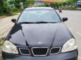 Nhà bán Daewoo Lacetti EX đời 2005, màu đen số sàn