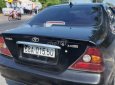 Cần bán gấp Daewoo Magnus đời 2004, màu đen, 132tr