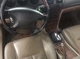 Cần bán gấp Daewoo Magnus đời 2004, màu đen, 132tr
