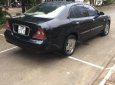 Cần bán Daewoo Magnus 2.5 AT sản xuất năm 2004, màu đen số tự động