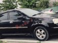 Cần bán lại xe Daewoo Lacetti EX 1.6 MT đời 2005, màu đen