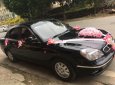 Bán Daewoo Nubira đời 2003, màu đen, số tự động, 75 triệu