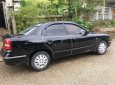 Bán Daewoo Nubira đời 2003, màu đen, số tự động, 75 triệu