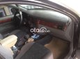 Cần bán lại xe Daewoo Lacetti 1.6 MT năm 2011, màu đen, nhập khẩu nguyên chiếc như mới