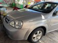 Cần bán lại xe Daewoo Lacetti EX đời 2010, màu bạc còn mới 