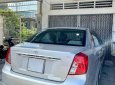 Cần bán lại xe Daewoo Lacetti EX đời 2010, màu bạc còn mới 