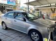 Cần bán lại xe Daewoo Lacetti EX đời 2010, màu bạc còn mới 
