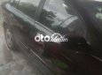 Cần bán xe Daewoo Magnus đời 2004, màu đen, nhập khẩu, 85 triệu