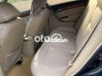 Cần bán xe Daewoo Gentra 2009, màu đen xe gia đình