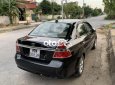 Cần bán xe Daewoo Gentra 2009, màu đen xe gia đình