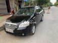 Cần bán xe Daewoo Gentra 2009, màu đen xe gia đình