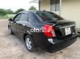 Xe Daewoo Lacetti năm sản xuất 2005, màu đen còn mới, giá chỉ 140 triệu