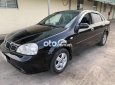 Xe Daewoo Lacetti năm sản xuất 2005, màu đen còn mới, giá chỉ 140 triệu
