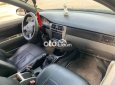 Xe Daewoo Lacetti năm sản xuất 2005, màu đen còn mới, giá chỉ 140 triệu