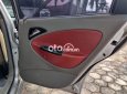 Cần bán gấp Daewoo Nubira đời 2002, màu bạc