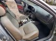 Cần bán gấp Daewoo Nubira đời 2002, màu bạc