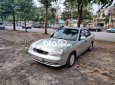 Cần bán gấp Daewoo Nubira đời 2002, màu bạc