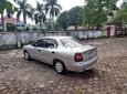 Cần bán gấp Daewoo Nubira đời 2002, màu bạc