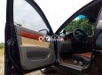 Cần bán gấp Daewoo Lacetti MT đời 2005, màu đen, giá chỉ 125 triệu