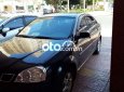 Cần bán gấp Daewoo Lacetti MT đời 2005, màu đen, giá chỉ 125 triệu