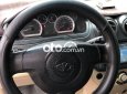 Cần bán lại xe Daewoo Gentra MT đời 2009, màu trắng xe gia đình