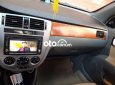 Cần bán gấp Daewoo Lacetti MT đời 2005, màu đen, giá chỉ 125 triệu
