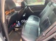 Bán xe Daewoo Gentra SX sản xuất năm 2010, màu đen, xe nhập