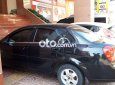 Cần bán gấp Daewoo Lacetti MT đời 2005, màu đen, giá chỉ 125 triệu