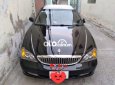 Cần bán lại xe Daewoo Magnus năm 2004, màu đen, giá 180tr