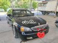 Cần bán lại xe Daewoo Magnus năm 2004, màu đen, giá 180tr