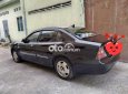 Cần bán lại xe Daewoo Magnus năm 2004, màu đen, giá 180tr