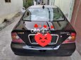 Cần bán lại xe Daewoo Magnus năm 2004, màu đen, giá 180tr