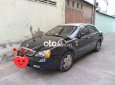 Cần bán lại xe Daewoo Magnus năm 2004, màu đen, giá 180tr