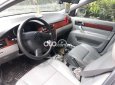 Bán xe Daewoo Lacetti MT năm sản xuất 2004, màu bạc