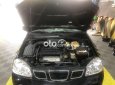 Cần bán gấp Daewoo Lacetti SE năm sản xuất 2004, màu đen giá cạnh tranh