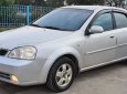 Cần bán gấp Daewoo Lacetti MT năm 2005, màu bạc xe gia đình