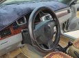 Cần bán gấp Daewoo Lacetti MT năm 2005, màu bạc xe gia đình