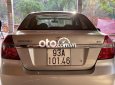 Cần bán gấp Daewoo Gentra SX sản xuất 2010, màu bạc, nhập khẩu