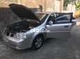 Bán Daewoo Lacetti MT năm sản xuất 2004, màu bạc, 101tr