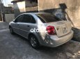 Bán Daewoo Lacetti MT năm sản xuất 2004, màu bạc, 101tr