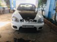 Bán xe Daewoo Lanos MT sản xuất 2002, màu trắng, giá tốt
