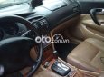 Bán Daewoo Magnus 2.0 năm 2004, màu đen số tự động