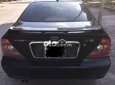 Cần bán xe Daewoo Magnus 2.5AT sản xuất 2004, màu đen, chính chủ