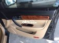 Cần bán xe Daewoo Magnus 2.5AT sản xuất 2004, màu đen, chính chủ