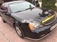 Cần bán xe Daewoo Magnus 2.5AT sản xuất 2004, màu đen, chính chủ